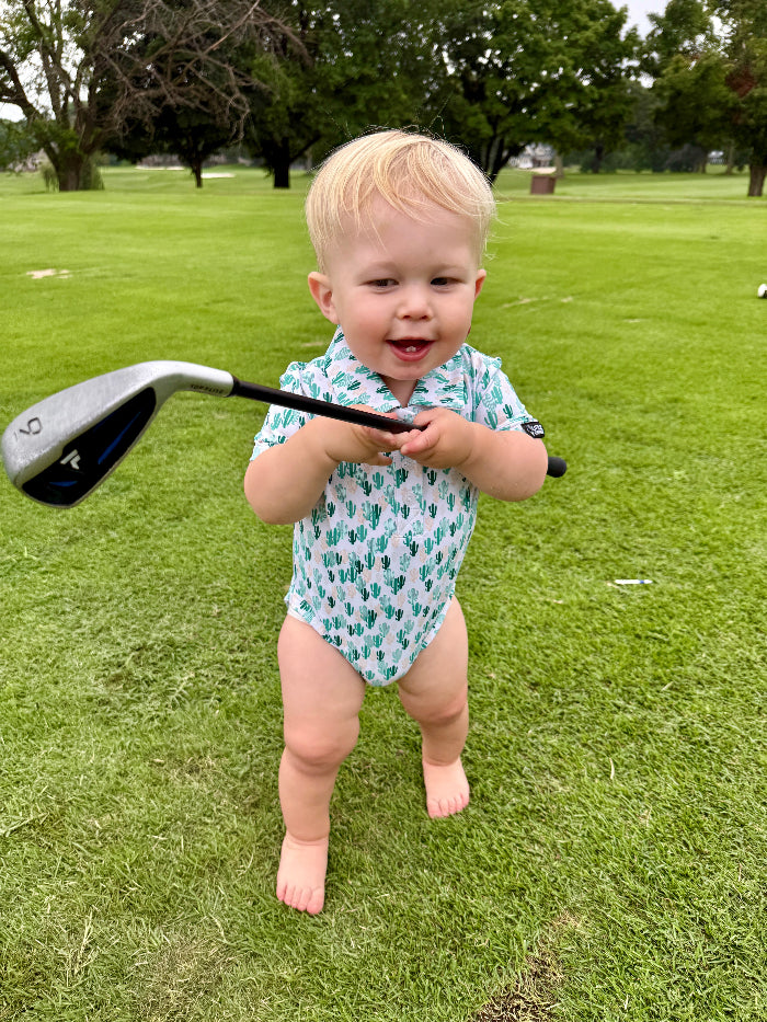 Palm desert onesie golf polo